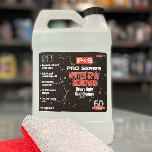 P&S Pro Series Water Spot Remover container with a red and gray towel in a garage setting
